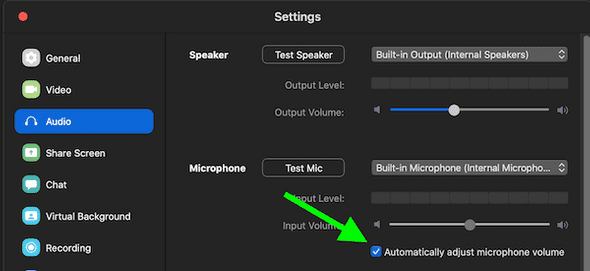 Screenshot of the Zoom settings dialog shows many options along the left side, including Audio (which is currently selected), and the detailed settings on the right pane of the interface. From top to bottom the audio settings include settings for the Speaker (a test speaker button, a speaker selector, an output volume indicator, and an output volume slider), followed by settings for the Microphone (a test mic button, a microphone selector, an input volume indicator, an input volume slider, and a checkbox that reads Automatically adjust microphone volume -- currently checked.)